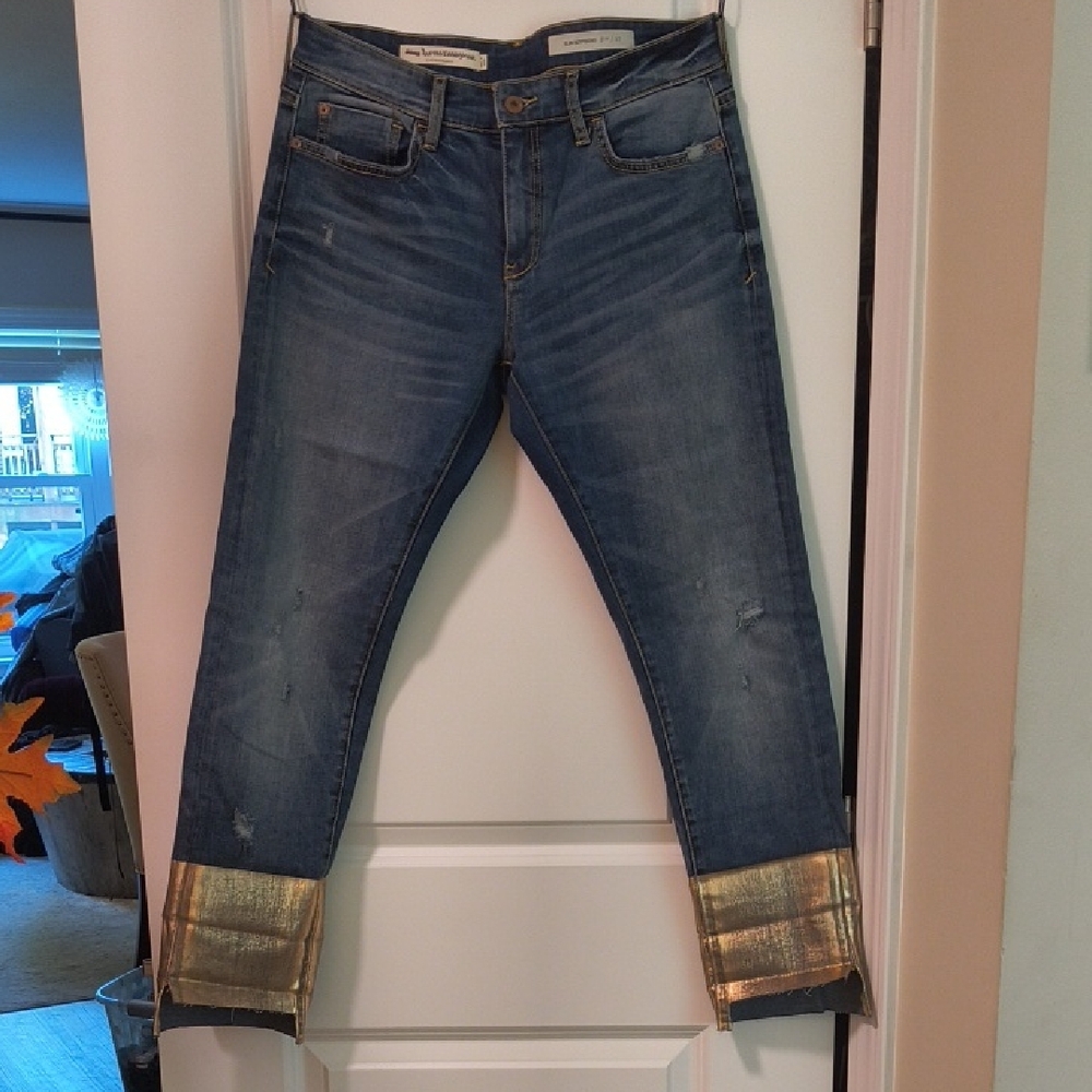 Anthropologie Blue Jeans with Gold Cuffs